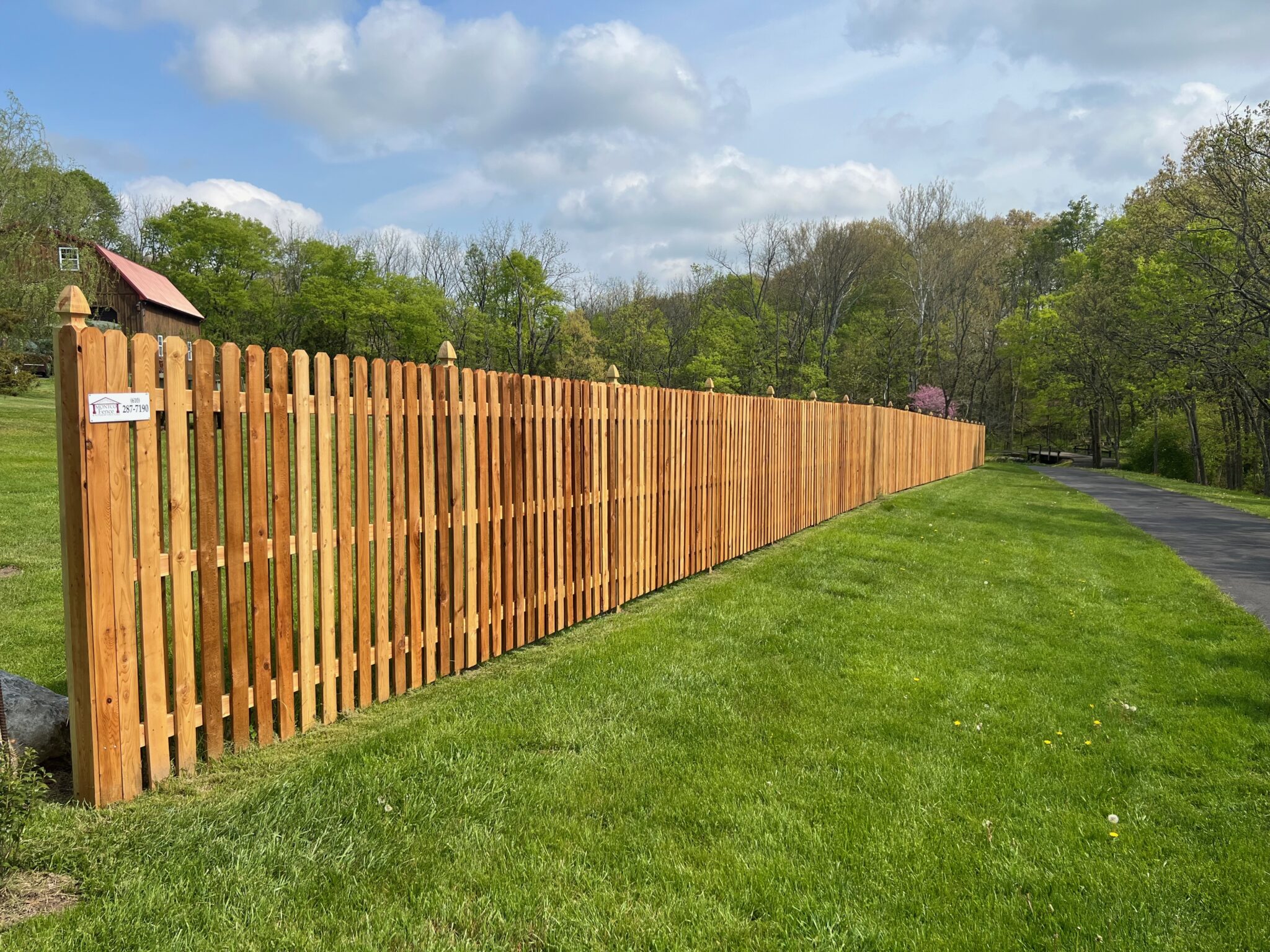 Comparison between aluminum and wood fences in terms of cost, durability, and aesthetics.